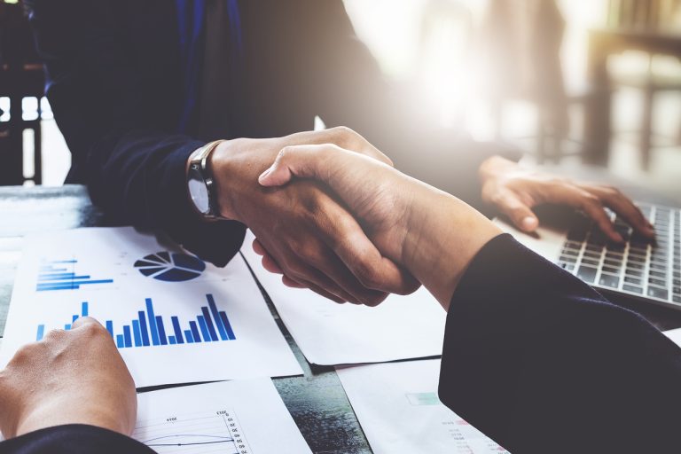 Business partnership consult and meeting concept. Image businessmans handshake. Successful businessmen handshaking after good deal. meeting concept