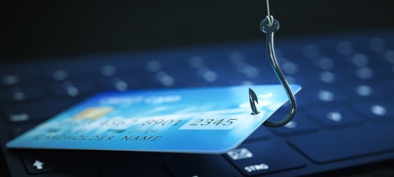 phishing credit card data with keyboard and hook symbol